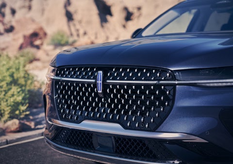 The stylish grille of a 2024 Lincoln Nautilus® SUV sparkles in the sunlight. | Lincoln Demo 2 in Wooster OH