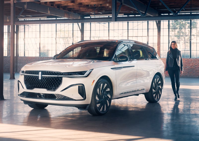 A person approaches a 2024 Lincoln Nautilus® SUV. | Lincoln Demo 2 in Wooster OH