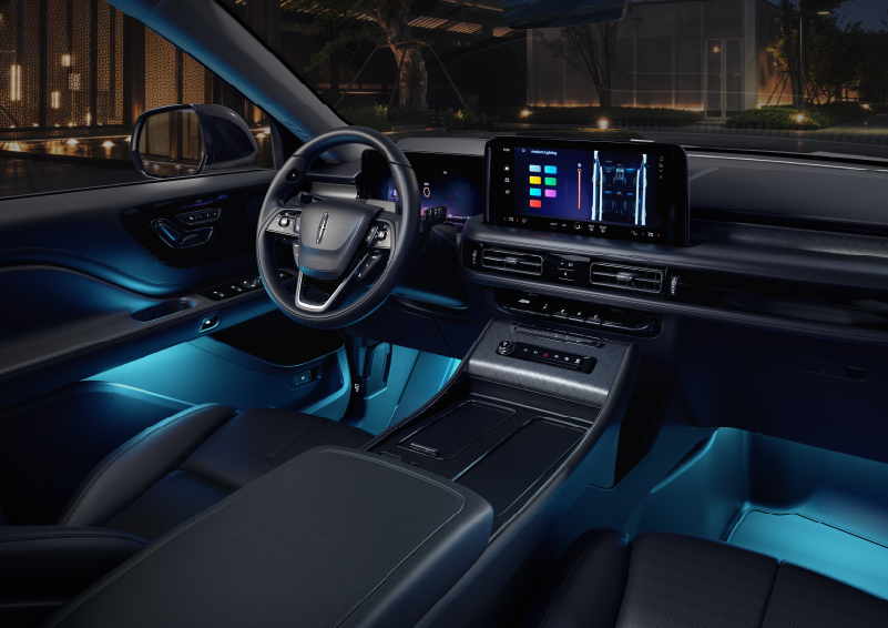 Deep blue ambient lighting glows from various places within a 2025 Lincoln Aviator® SUV. | Lincoln Demo 2 in Wooster OH