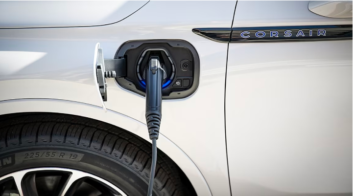 An electric charger is shown plugged into the charging port of a Lincoln Corsair® Grand Touring
model. | Lincoln Demo 2 in Wooster OH