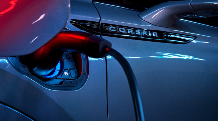 A charger plugged into the charging port of a 2025 Lincoln Corsair® Plug-in Hybrid model. | Lincoln Demo 2 in Wooster OH
