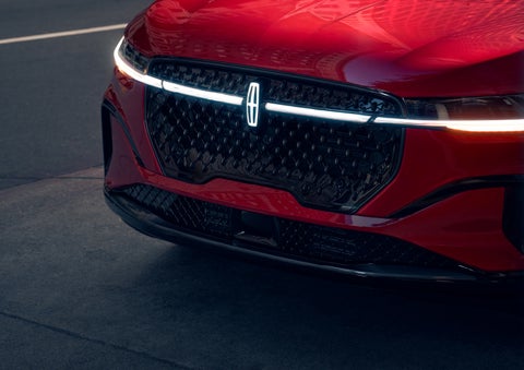 The available front LED light bar and center Lincoln Star logo glow at dusk. | Lincoln Demo 2 in Wooster OH