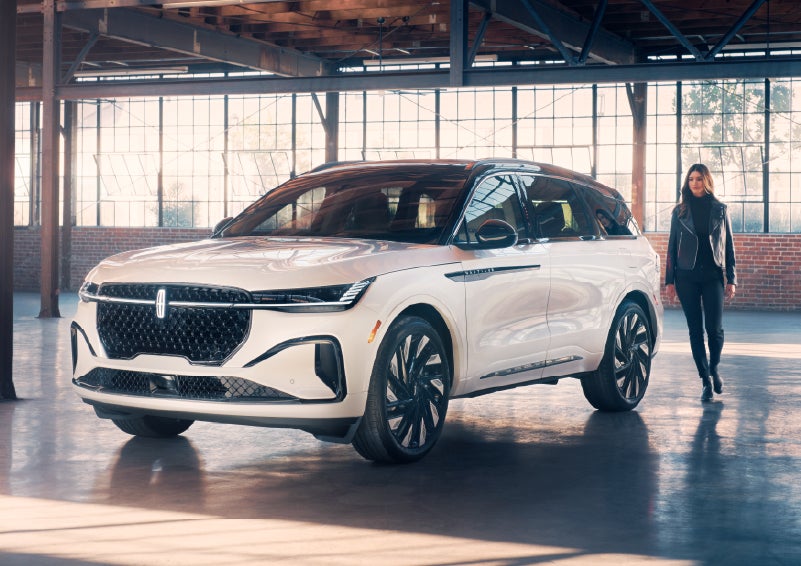 A person approaches a 2026 Lincoln Nautilus® SUV. | Lincoln Demo 2 in Wooster OH