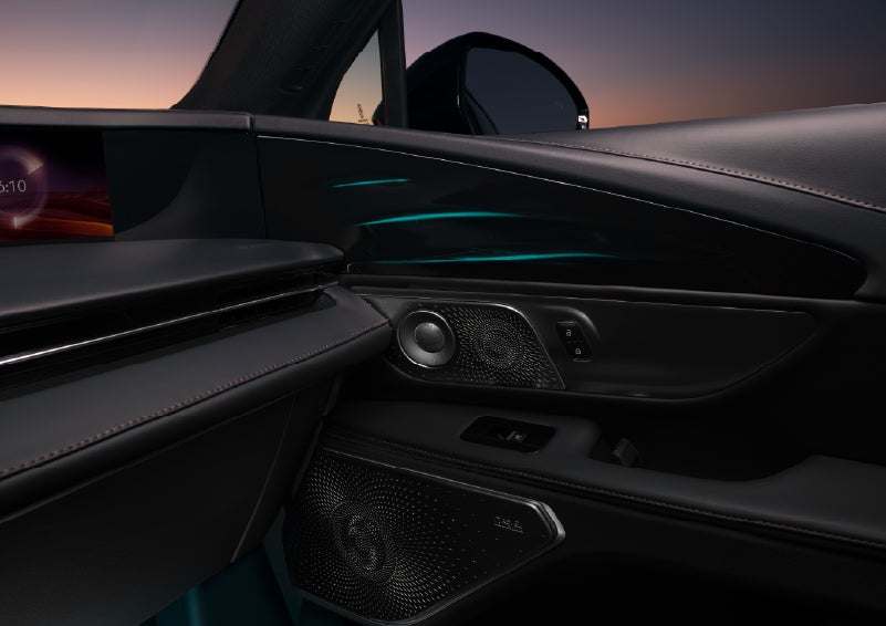 Selectable ambient lighting glows in the passenger door panel. | Lincoln Demo 2 in Wooster OH